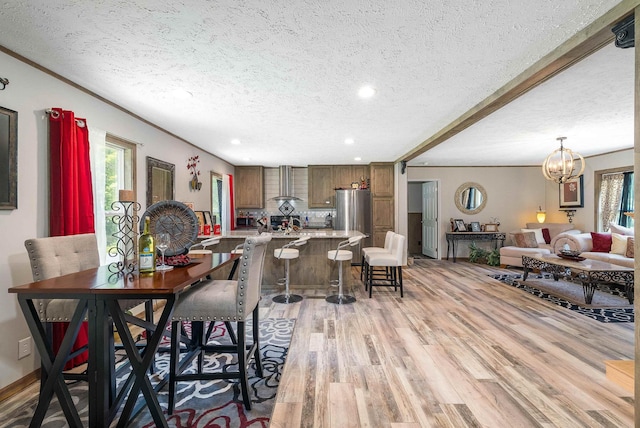 2749 Lee Hwy E, New Market, VA 22844 - dining area featuring light wood-style flooring, a textured ceiling, recessed lighting, and a chandelier