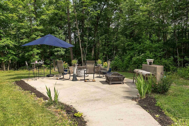 2749 Lee Hwy E, New Market, VA 22844 - view of patio featuring an outdoor fire pit and a forest view