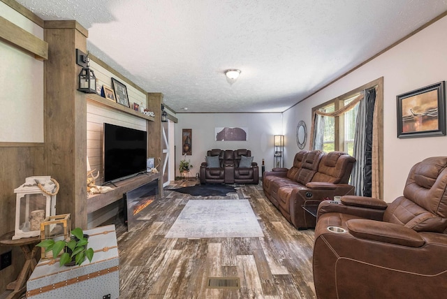 2749 Lee Hwy E, New Market, VA 22844 - living area featuring a textured ceiling, dark wood finished floors, and wood walls