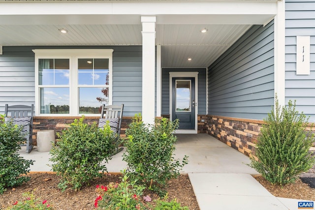 property entrance with a porch