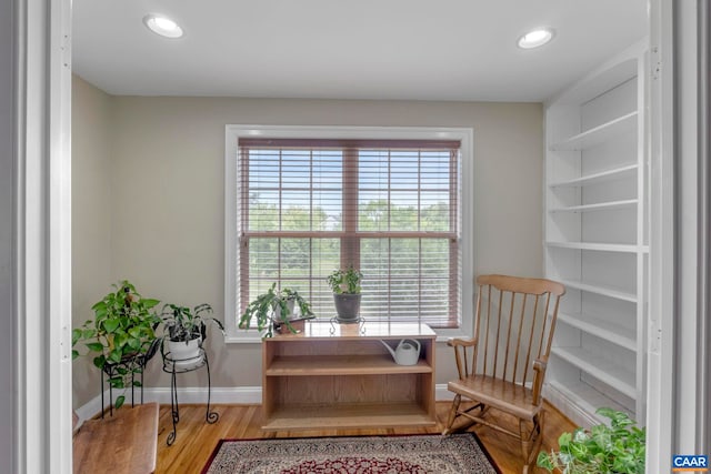 office area with baseboards, healthy amount of natural light, wood finished floors, and recessed lighting