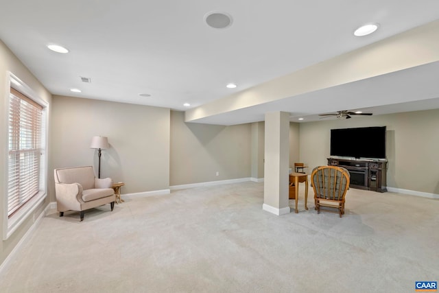 sitting room with light colored carpet, baseboards, recessed lighting, and ceiling fan