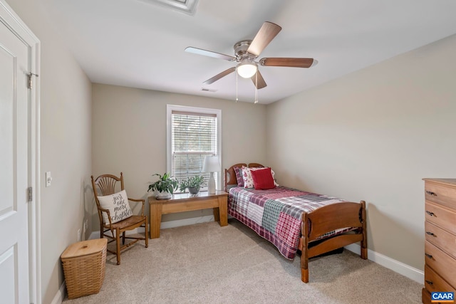bedroom with light carpet, ceiling fan, and baseboards