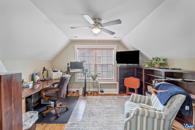 office with wood finished floors, a ceiling fan, and vaulted ceiling