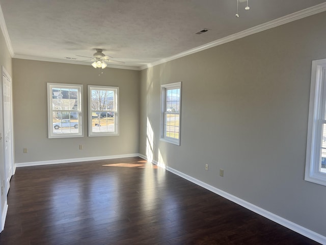 unfurnished room featuring ornamental molding, dark wood-type flooring, and ceiling fan