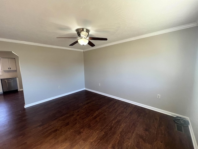 unfurnished room with crown molding, dark hardwood / wood-style floors, and ceiling fan