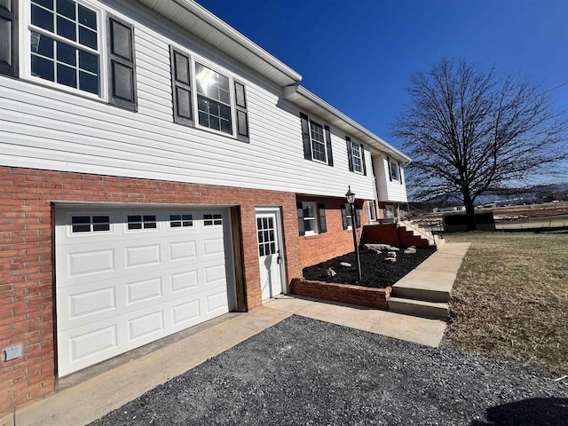 view of property exterior featuring a garage