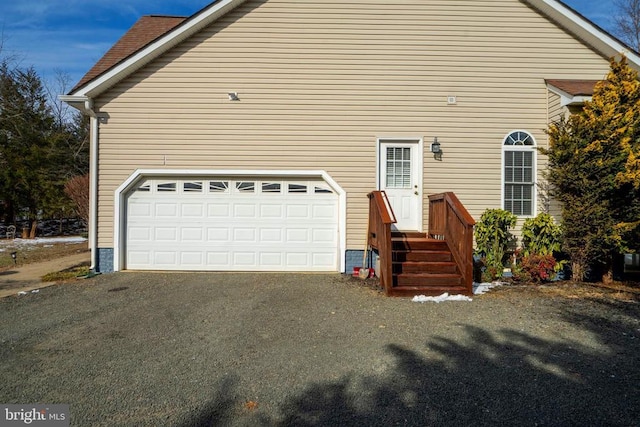 exterior space with a garage