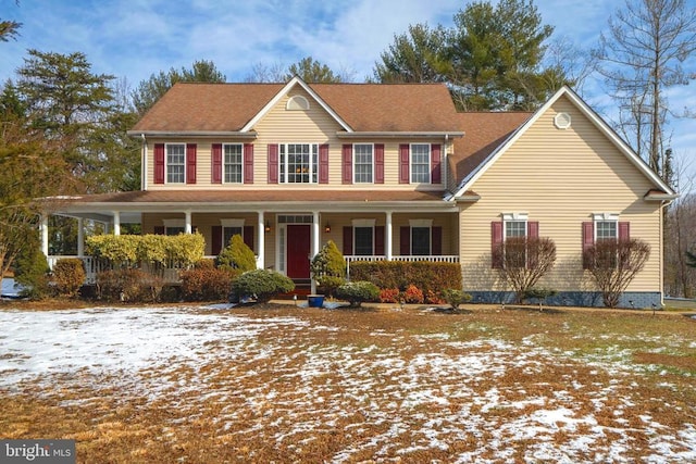 colonial inspired home with covered porch