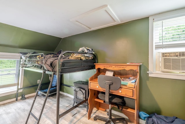 2420 Jollett Rd, Elkton, VA 22827 - bedroom featuring attic access, wood finished floors, lofted ceiling, baseboards, and a desk