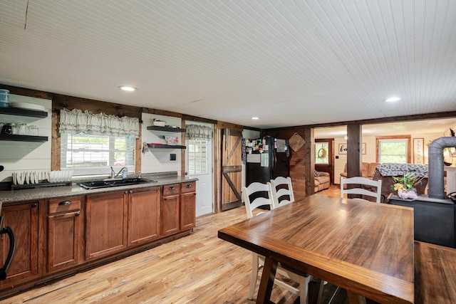 2420 Jollett Rd, Elkton, VA 22827 - dining room featuring light wood finished floors and wood walls