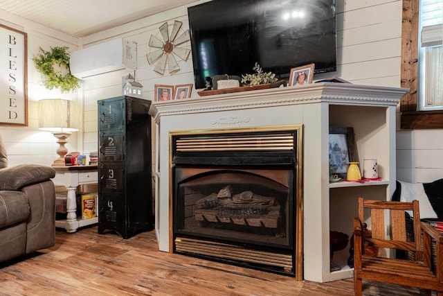 2420 Jollett Rd, Elkton, VA 22827 - detailed view of a wall mounted AC, wood finished floors, and wooden walls