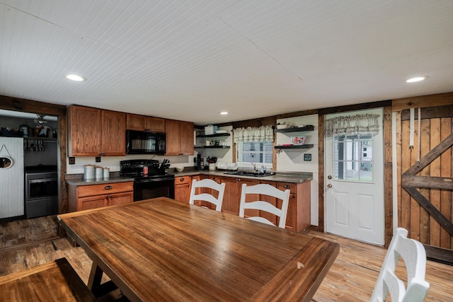 2420 Jollett Rd, Elkton, VA 22827 - kitchen featuring black appliances, open shelves, dark countertops, light wood-type flooring, and recessed lighting