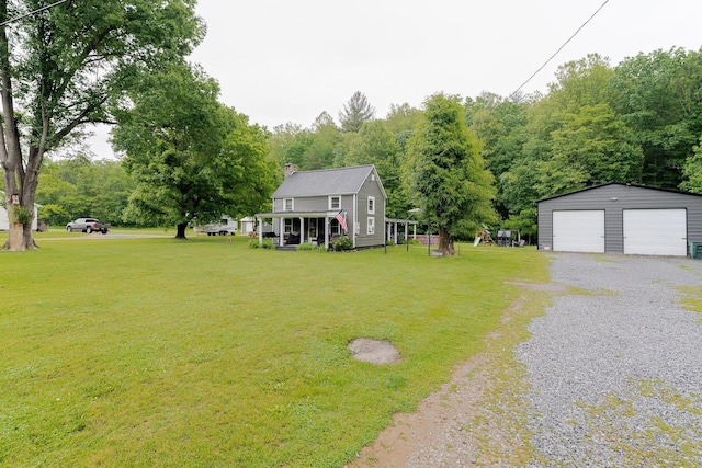 2420 Jollett Rd, Elkton, VA 22827 - view of green lawn featuring an outbuilding, a detached garage, and driveway