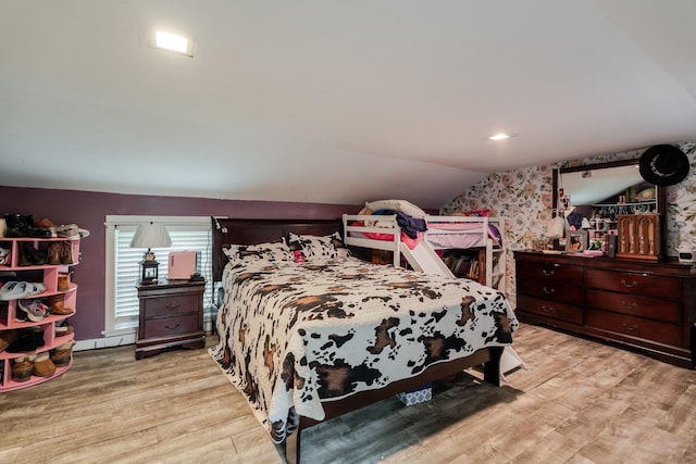 2420 Jollett Rd, Elkton, VA 22827 - bedroom featuring wood finished floors, lofted ceiling, and a baseboard heating unit