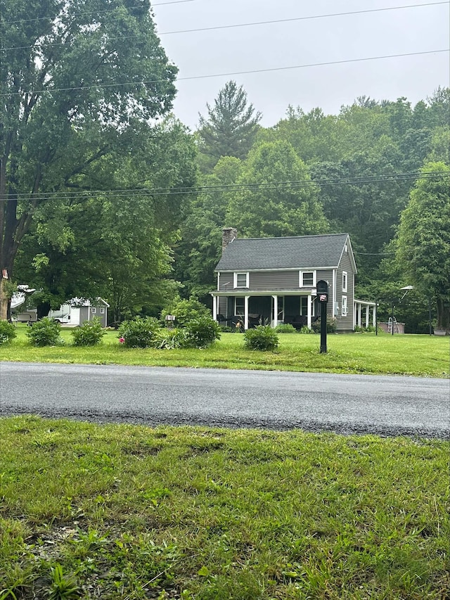 2420 Jollett Rd, Elkton, VA 22827 - view of asphalt road featuring a forest view
