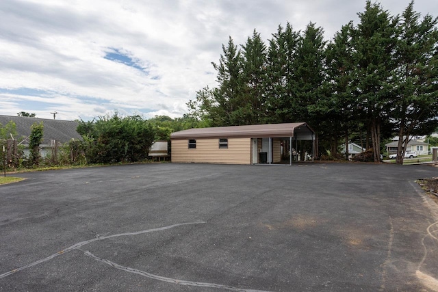 exterior space featuring a carport