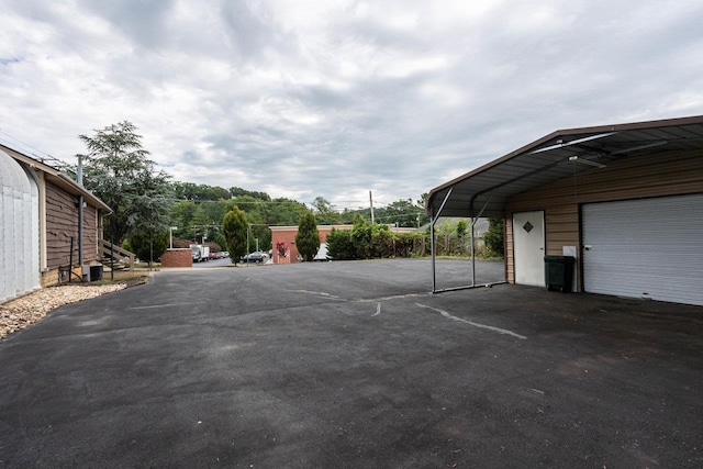 view of car parking featuring a carport