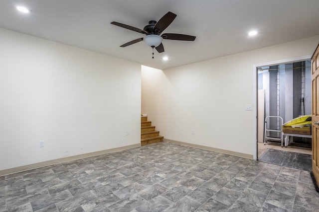 spare room with ceiling fan