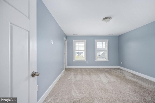 view of carpeted spare room