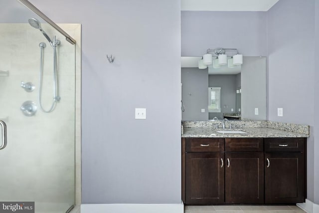 bathroom featuring vanity and walk in shower