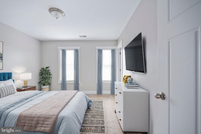 bedroom featuring light hardwood / wood-style flooring