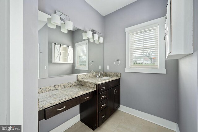 bathroom featuring vanity and tile patterned flooring