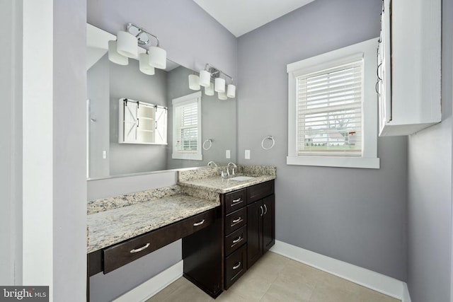 bathroom featuring vanity and tile patterned flooring