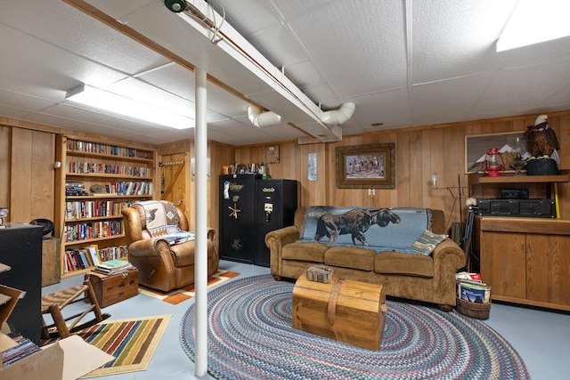 537 High Valley Dr N, Monterey, VA 24465 - living area with wooden walls, finished concrete flooring, and built in shelves