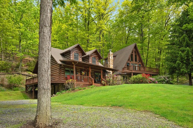 537 High Valley Dr N, Monterey, VA 24465 - cabin with a front lawn, log siding, and a wooden deck