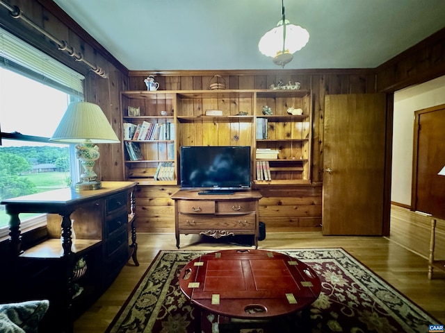 1820 Springhill Rd, Staunton, VA 24401 - living area featuring wood walls, wood finished floors, and crown molding