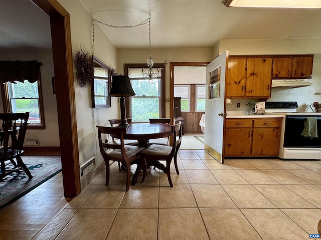 1820 Springhill Rd, Staunton, VA 24401 - dining space featuring plenty of natural light, a chandelier, light tile patterned floors, and baseboards
