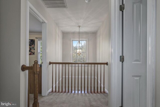 8802 Dundee Dr, Fredericksburg, VA 22408 - hall with an upstairs landing, carpet, and a chandelier
