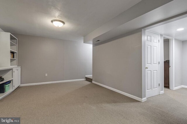 8802 Dundee Dr, Fredericksburg, VA 22408 - finished basement with light colored carpet and baseboards