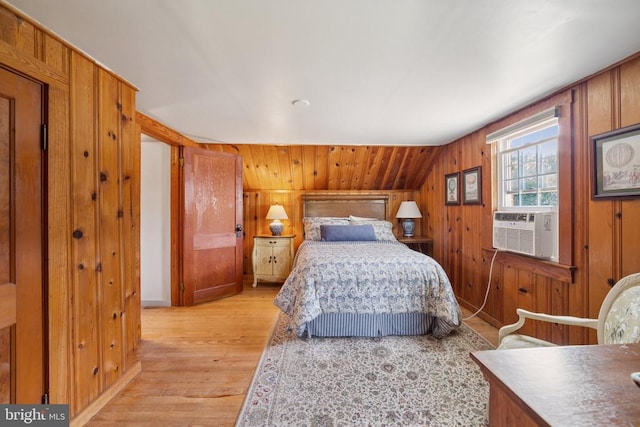 12014 Jefferson Hwy, Mineral, VA 23117 - bedroom featuring light wood-type flooring, wood walls, and cooling unit