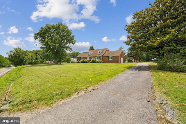 12014 Jefferson Hwy, Mineral, VA 23117 - cape cod home with a garage, a front yard, and driveway