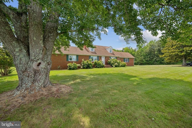 12014 Jefferson Hwy, Mineral, VA 23117 - view of front facade with a front lawn and brick siding