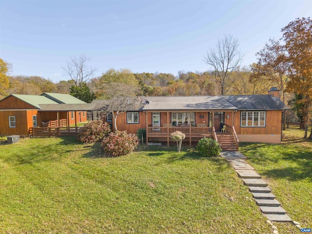 7930 Old Green Mountain Rd, Esmont, VA 22937 - rear view of property with a yard, a wooden deck, and a chimney