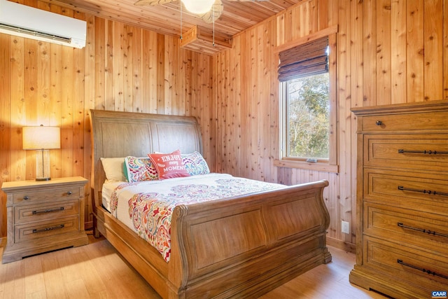 7930 Old Green Mountain Rd, Esmont, VA 22937 - bedroom with an AC wall unit, wooden walls, wood ceiling, and light wood-style floors