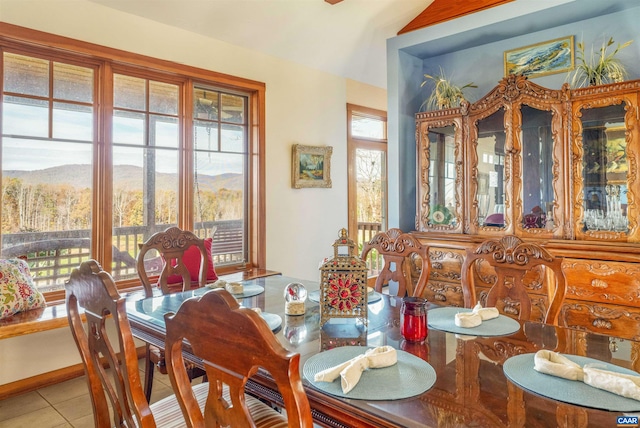 7930 Old Green Mountain Rd, Esmont, VA 22937 - dining area with a mountain view, tile patterned floors, and lofted ceiling
