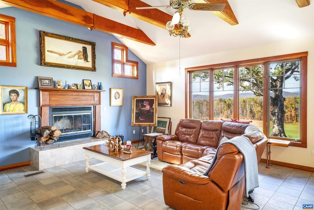 7930 Old Green Mountain Rd, Esmont, VA 22937 - living room featuring lofted ceiling with beams, tile patterned floors, ceiling fan, baseboards, and a glass covered fireplace