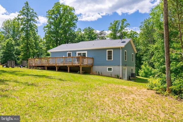 166 John Tucker Rd, Madison, VA 22727 - back of property with central AC unit, a wooden deck, and a yard