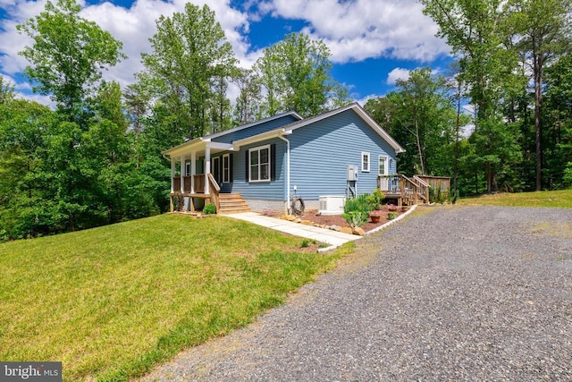166 John Tucker Rd, Madison, VA 22727 - single story home with a porch, a front lawn, driveway, and ac unit