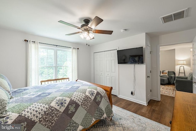 166 John Tucker Rd, Madison, VA 22727 - bedroom featuring dark wood-style flooring, a closet, a ceiling fan, and baseboards