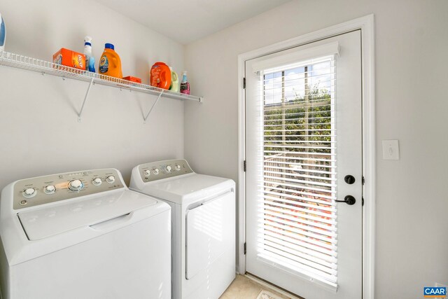 laundry room featuring washer and clothes dryer