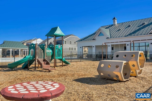communal playground featuring fence