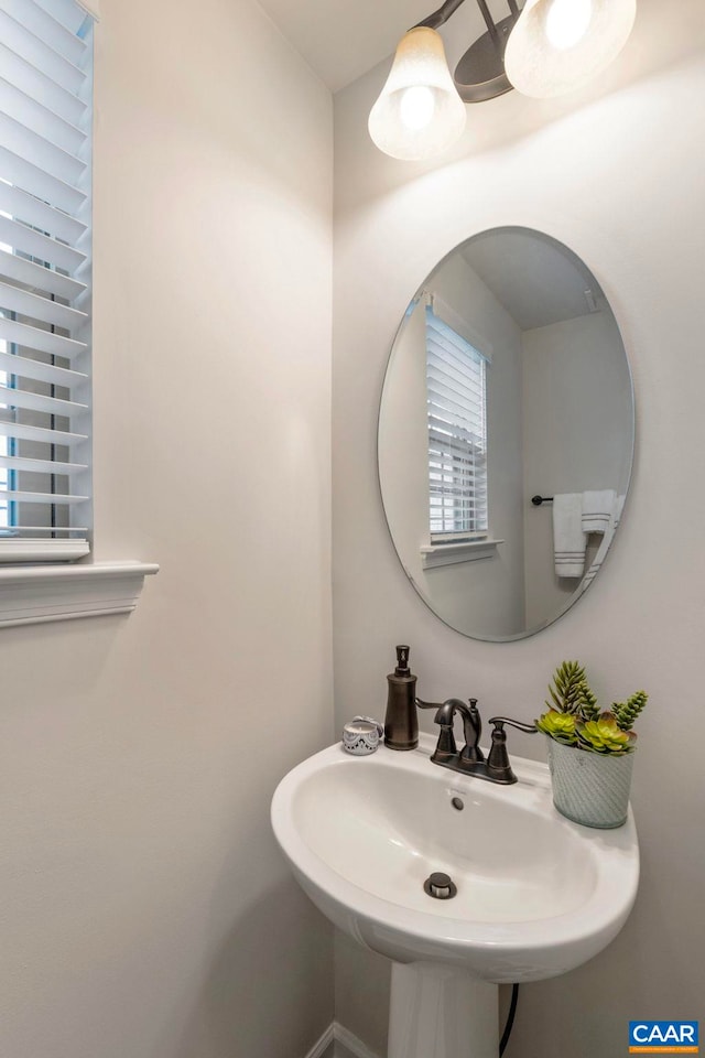 bathroom featuring a sink and healthy amount of natural light