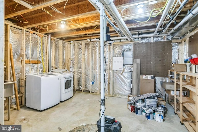 unfinished below grade area with washing machine and dryer