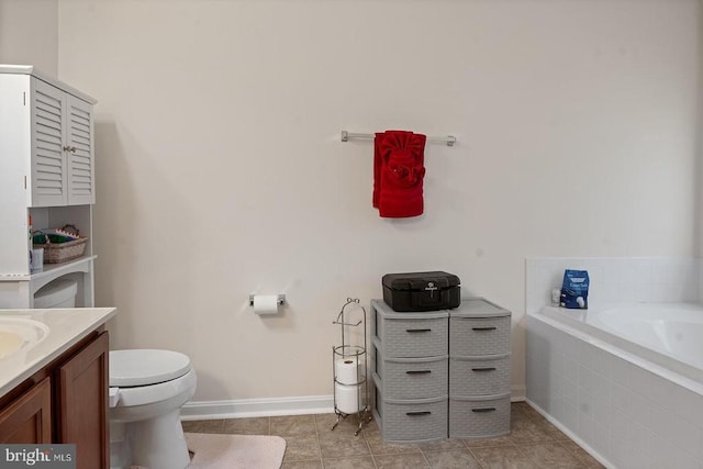 636 Windermere, Culpeper, VA 22701 - bathroom with tiled bath, baseboards, toilet, tile patterned floors, and vanity