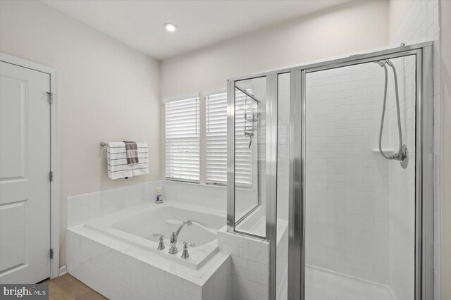 14219 Belle Ave, Culpeper, VA 22701 - bathroom with a stall shower and a garden tub